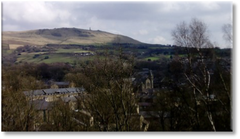 Quarries Walk - views over Uppermill to Pots and Pans obelisk